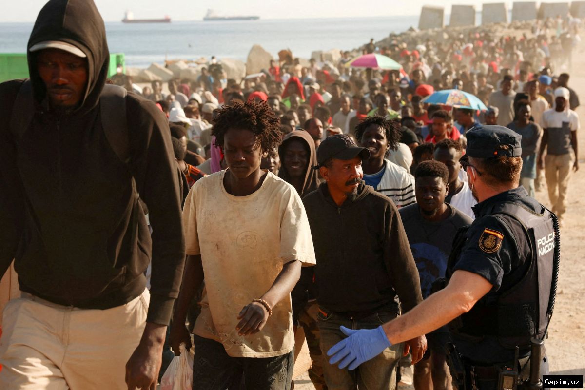 Original: Ceuta migrants Spain Frontex 🇪🇸🚨 Ispaniya Seutadagi 5000 muhojirni qayta ishlash uchun Frontexdan yordam so'radi