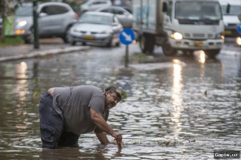 🌧️⚡ Oʻrta Sharqni qamrab olgan kuchli boʻronlar va toshqinlar