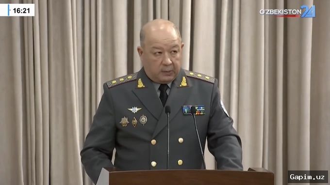 🤖🛡️ During Kazakh President's Bukhara Visit: Security Guard Spotted with Anti-Drone Rifle