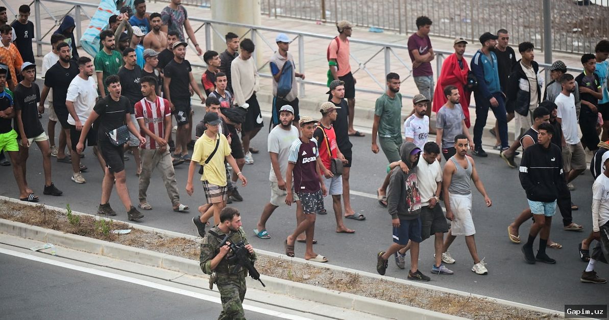 🌍🚧 Spain says 'virtually all' of 60,000 migrants who stormed Ceuta have returned