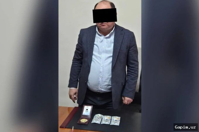 ⚖️💰 Surxondaryo sudi xodimi 53 ming dollar pora olgan vaqtida ushlandi