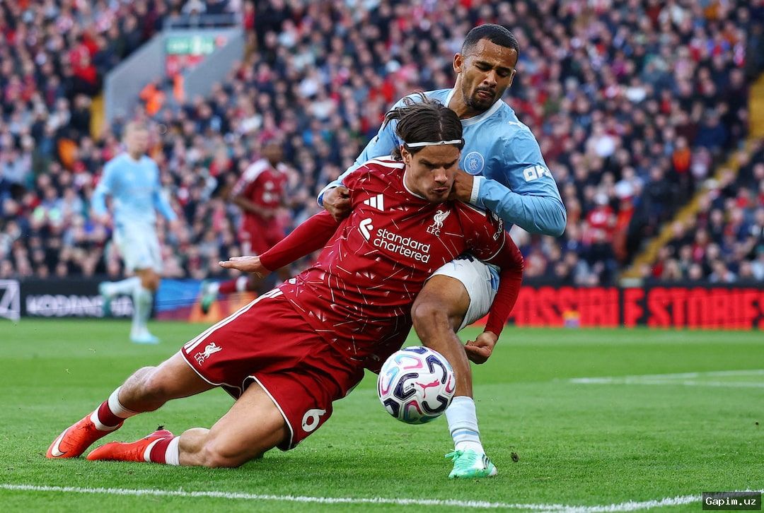 ⚽️🏟️ Financial Fallout at Anfield: Manchester City Secures Victory Amid Hostile Fan Protests